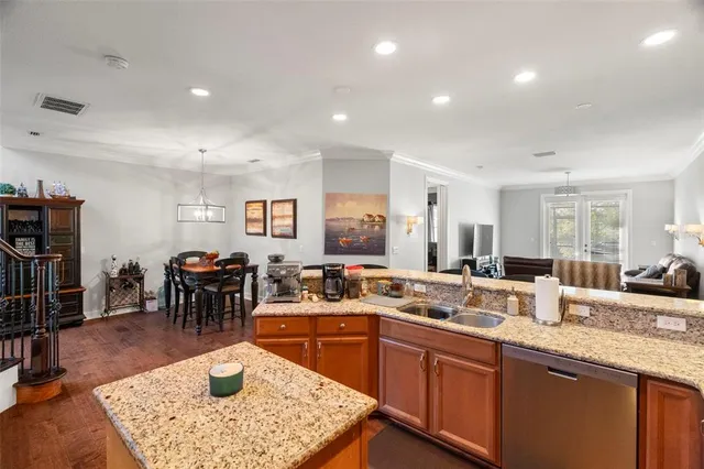 a kitchen with lots of counter top space and dining table