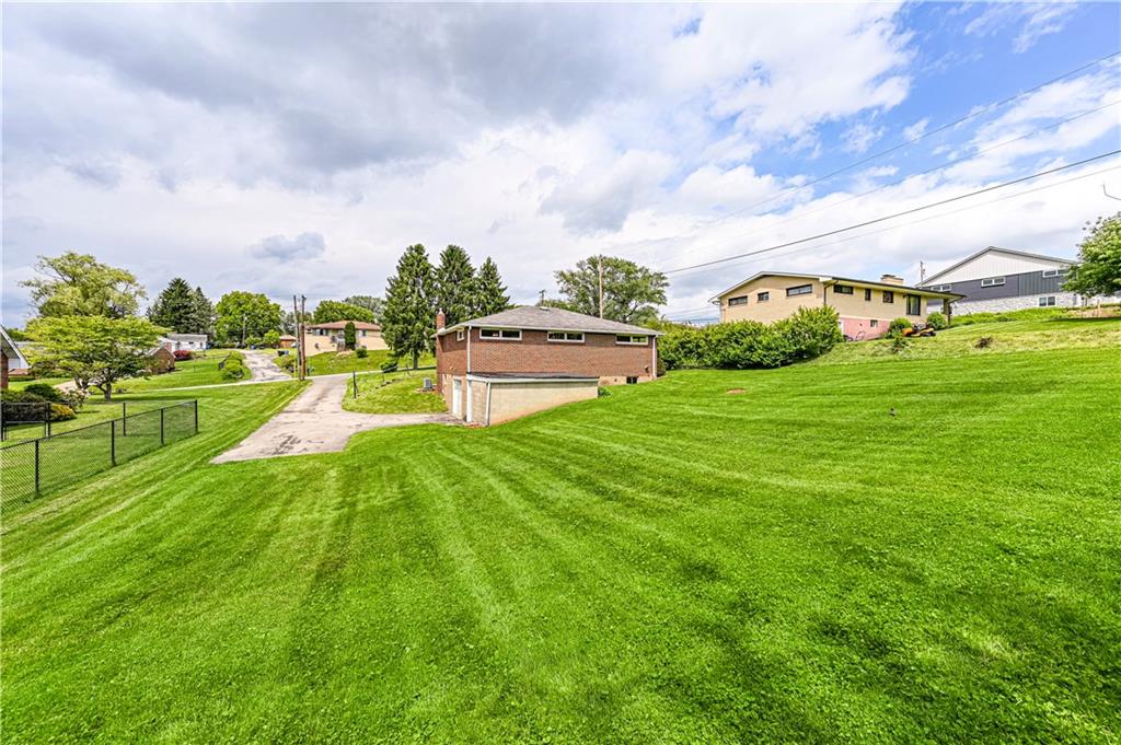 13740 Ridge Road Irwin, PA 15642 - Photo 40 of 43 a view of a garden with houses