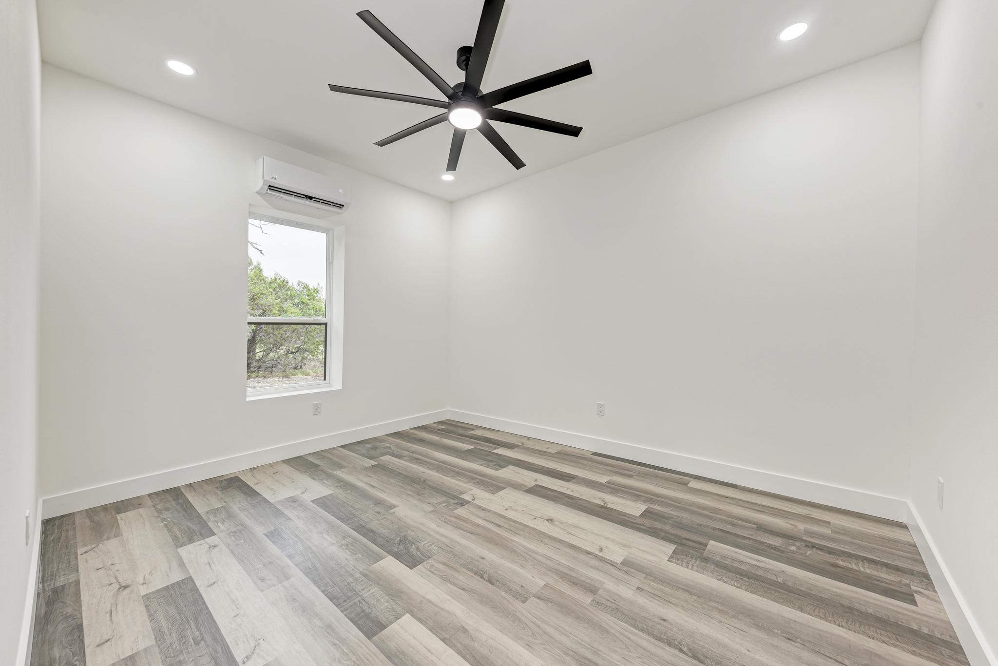 4190 West Fm 243 Bertram, TX 78605 - Photo 38 of 42 Bedroom in guest apartment off garage-virtually staged