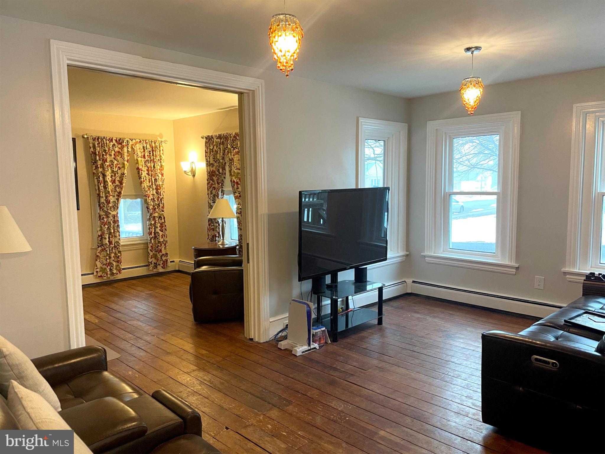 245 Maple Street Oxford, PA 19363 - Photo 3 of 23 a living room with furniture and a flat screen tv