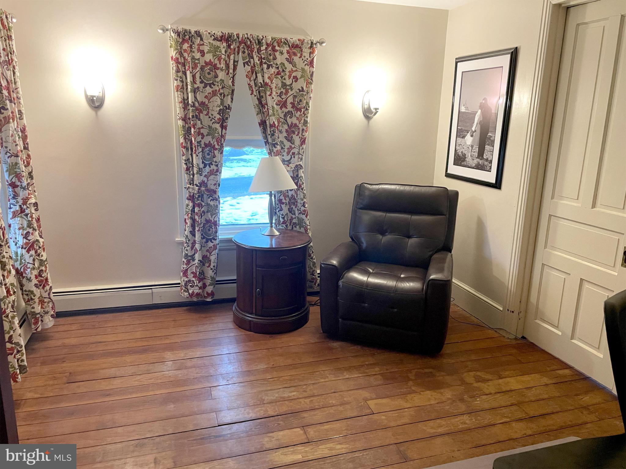245 Maple Street Oxford, PA 19363 - Photo 5 of 23 a living room with furniture and a window