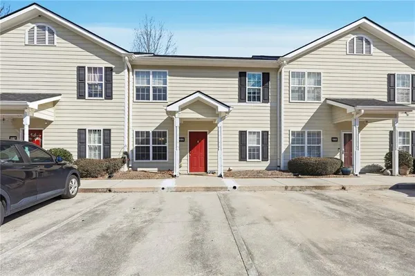 a front view of a house with a patio