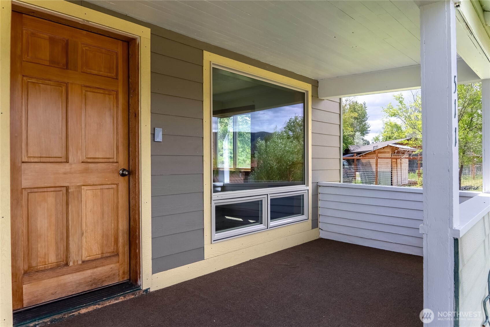 511 Bluff Street Winthrop, WA 98862 - Photo 17 of 38 a view of a porch with a door and balcony