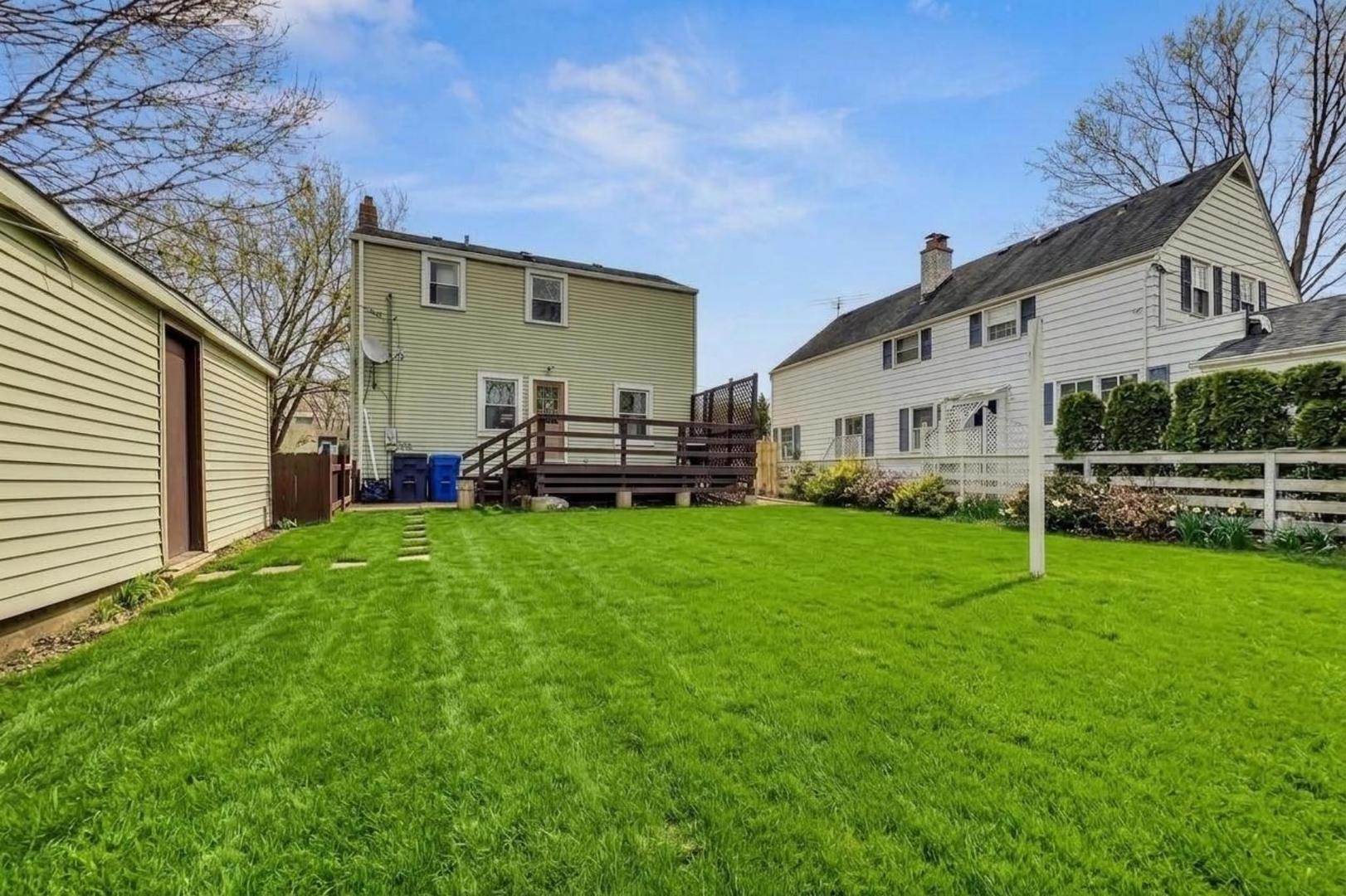 402 North Main Street Mount Prospect, IL 60056 - Photo 19 of 19 a view of a house with backyard