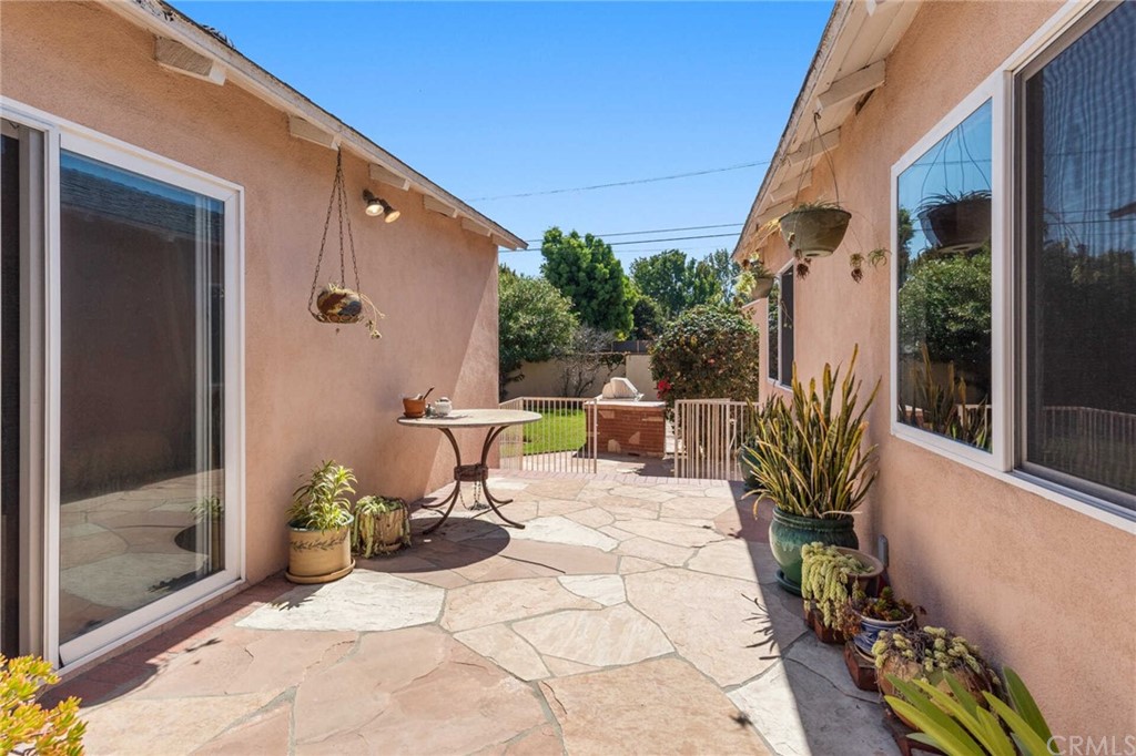 3381 Colbert Avenue Mar Vista, CA 90066 - Photo 19 of 23 a view of a chair and tables in the patio with a fire pit