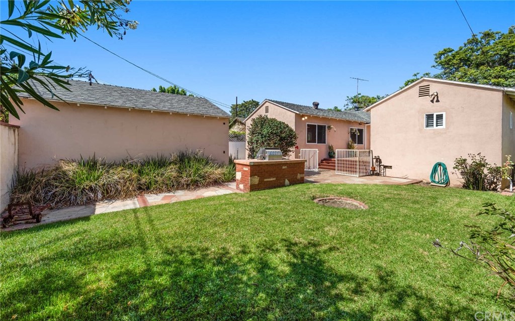 3381 Colbert Avenue Mar Vista, CA 90066 - Photo 22 of 23 a view of a backyard with plants and a patio
