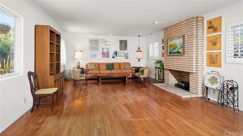3381 Colbert Avenue Mar Vista, CA 90066 - Photo 5 of 23 a living room with furniture and a fireplace