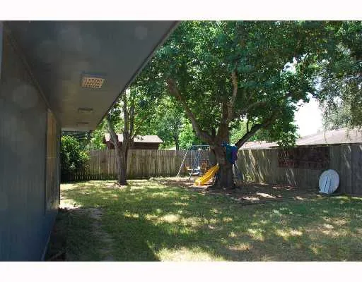 a view of a backyard with a slide