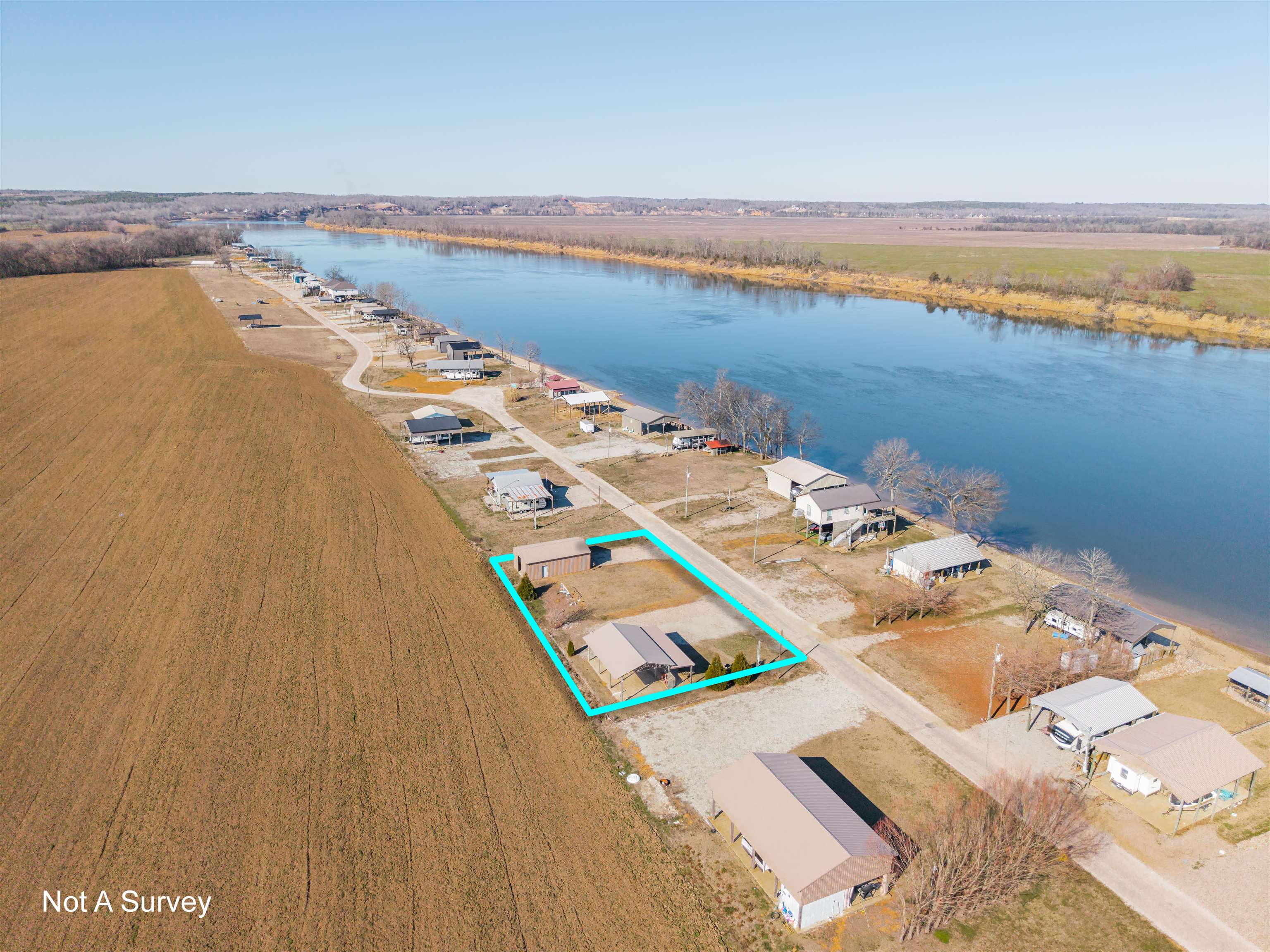 233 Jaycee Lane Adamsville, TN 38310 - Photo 12 of 18 a balcony with an ocean view and city view