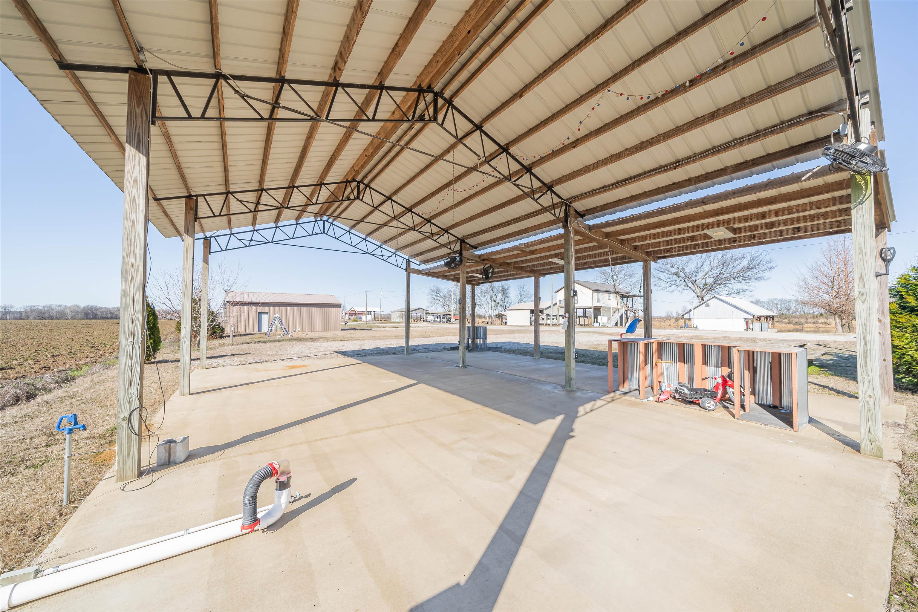 233 Jaycee Lane Adamsville, TN 38310 - Photo 2 of 18 a view of a swimming pool with a lounge chairs