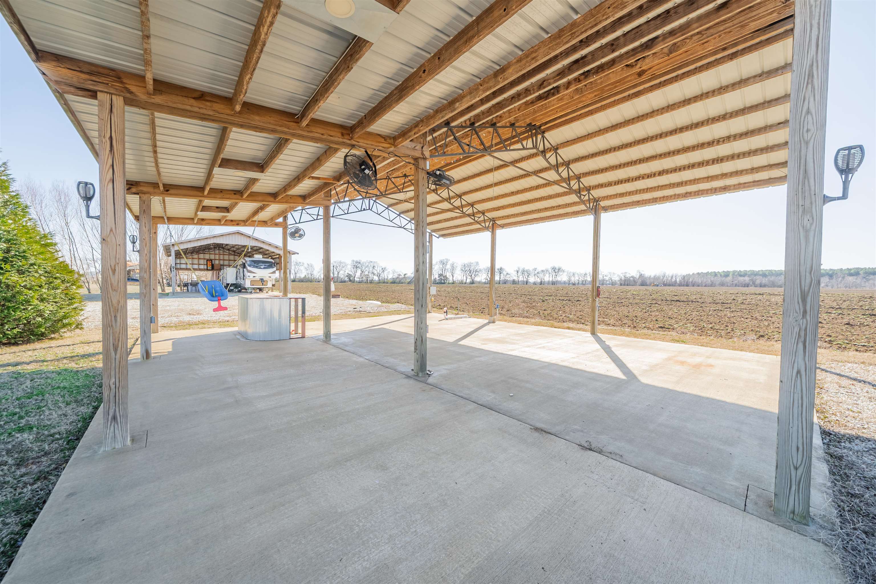 233 Jaycee Lane Adamsville, TN 38310 - Photo 5 of 18 a view of an empty room with windows