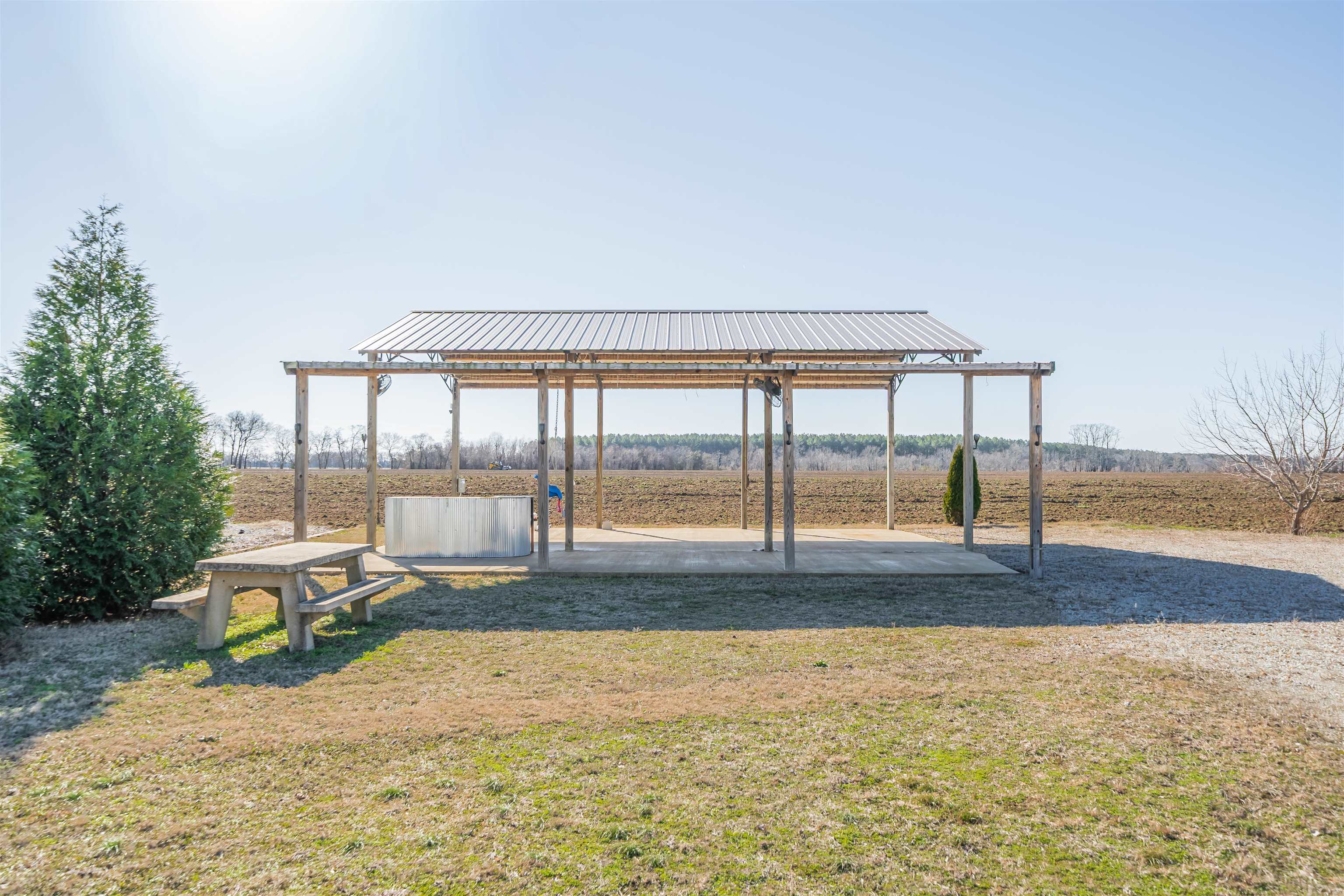 233 Jaycee Lane Adamsville, TN 38310 - Photo 6 of 18 a living room with a floor to ceiling window and pool table
