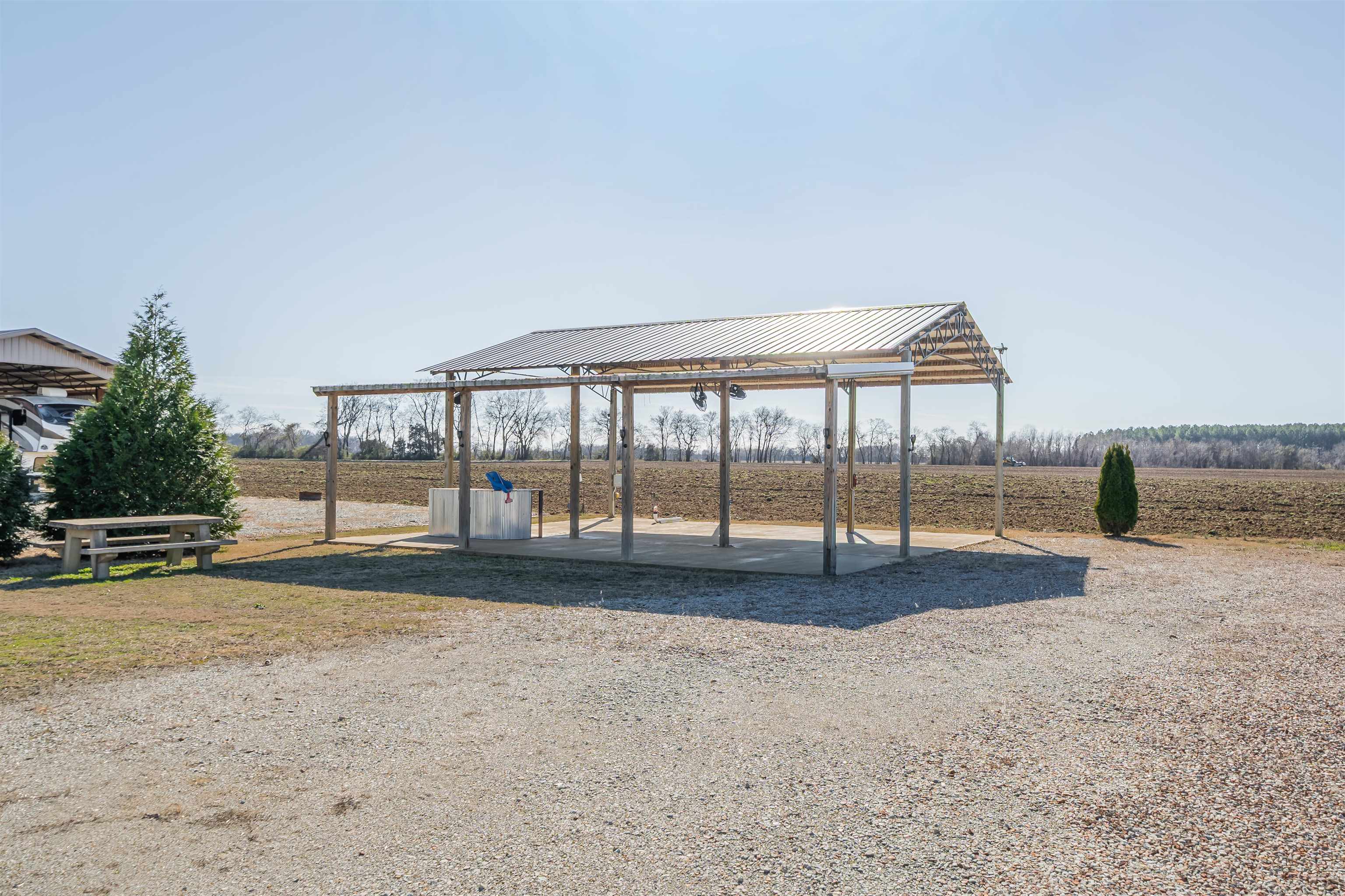 233 Jaycee Lane Adamsville, TN 38310 - Photo 7 of 18 a view of an outdoor space and yard