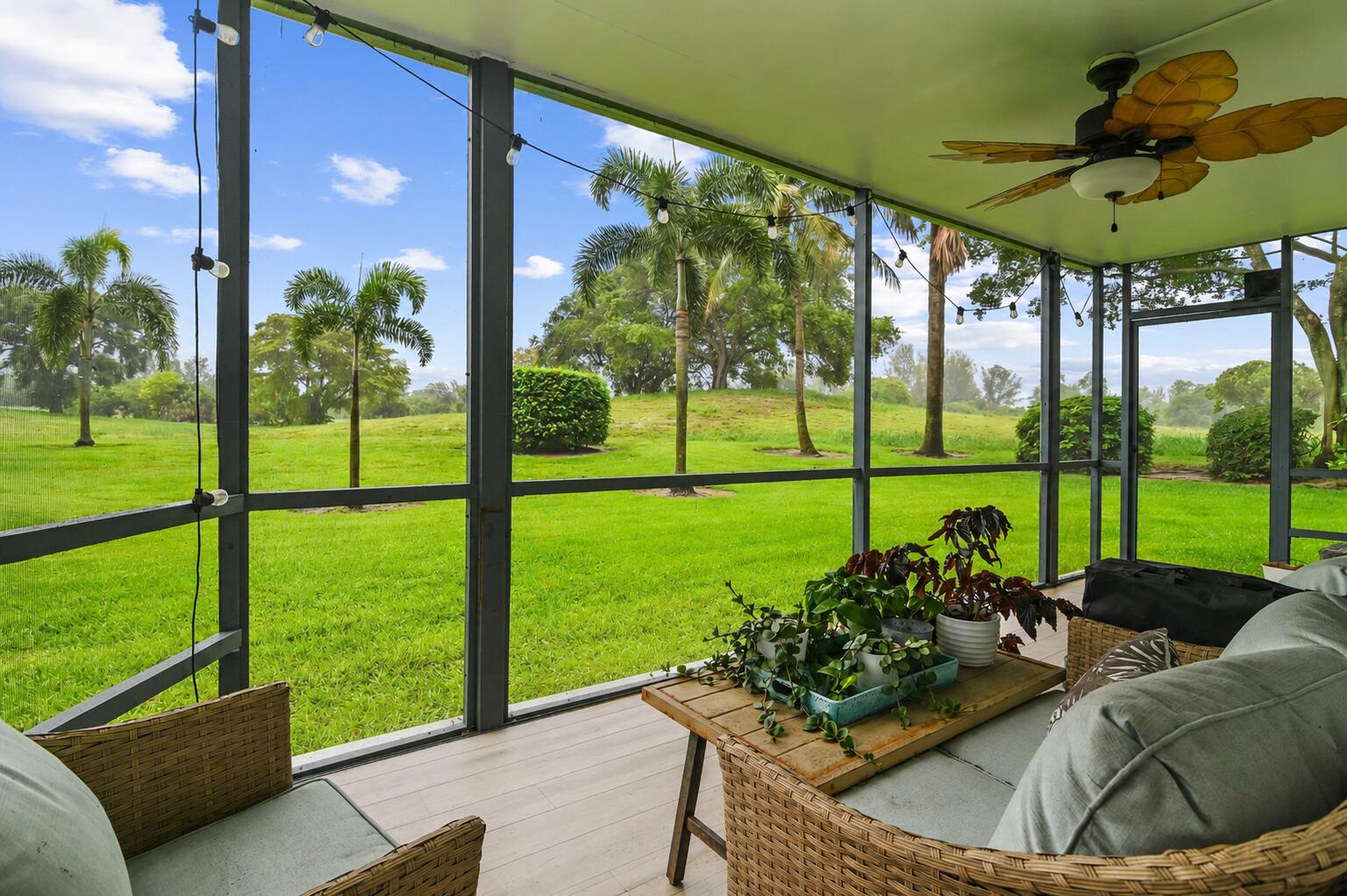 6400 Northwest 2nd Avenue, Unit 124 Boca Raton, FL 33487 - Photo 27 of 33 a view of a garden and patio