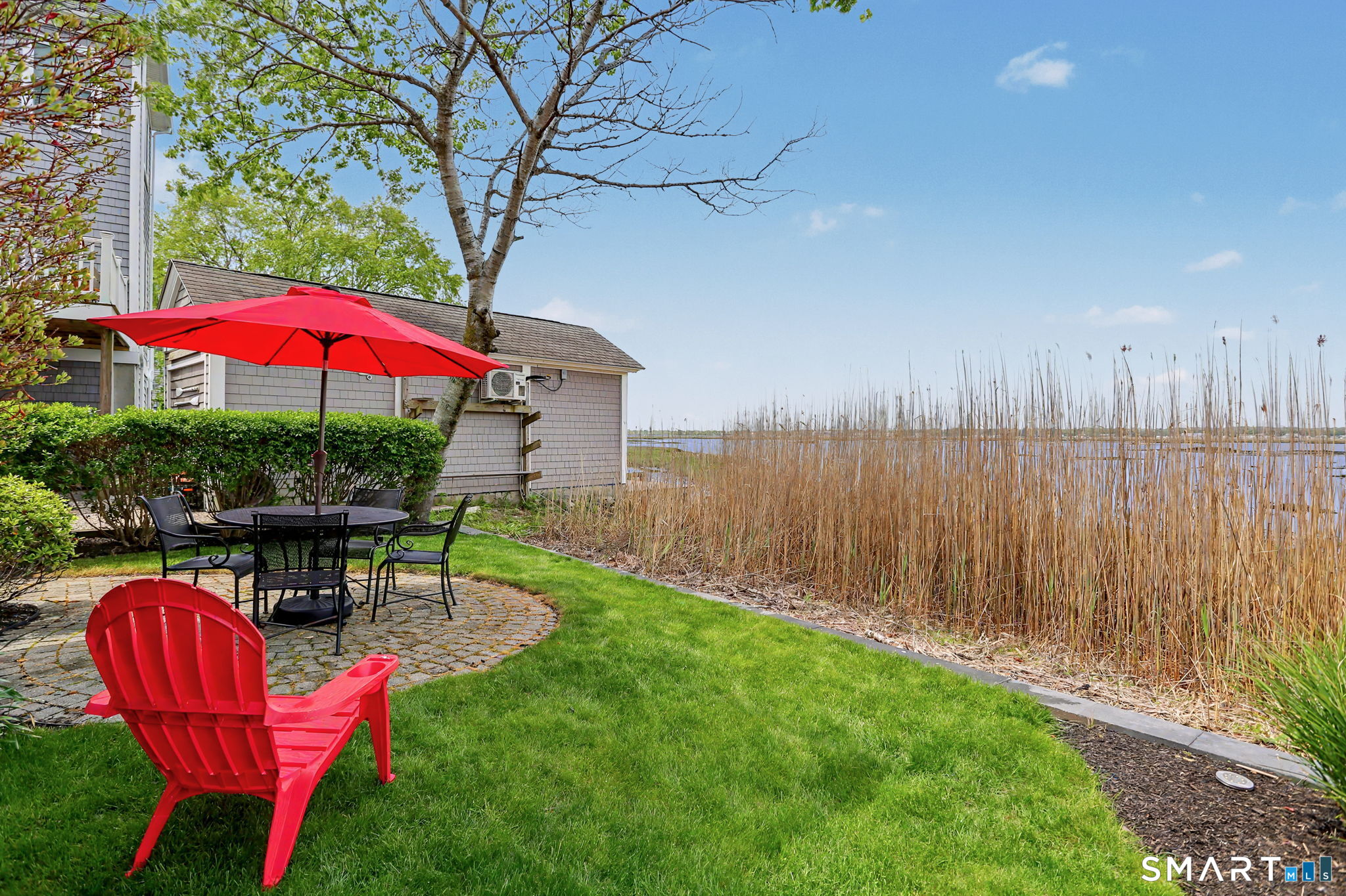 28 Milford Point Road Milford, CT 06460 - Photo 37 of 40 Back patio and Wheeler Marsh.