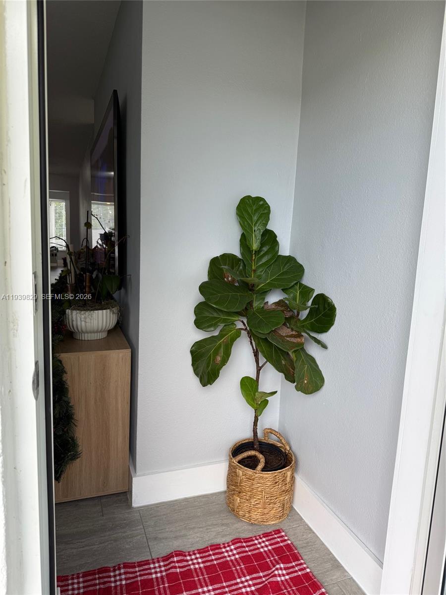 5280 Southwest 92nd Terrace Cooper City, FL 33328 - Photo 16 of 50 a glass vase with flowers