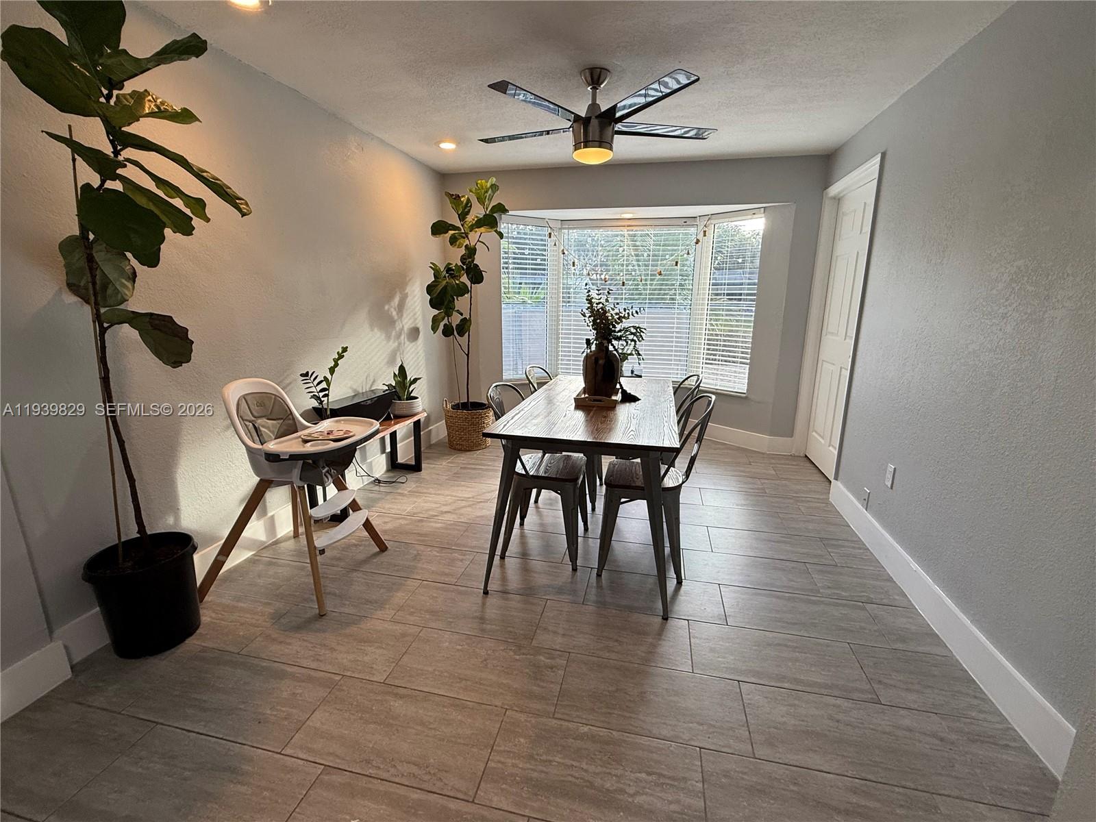 5280 Southwest 92nd Terrace Cooper City, FL 33328 - Photo 23 of 50 a view of a livingroom with furniture and a window