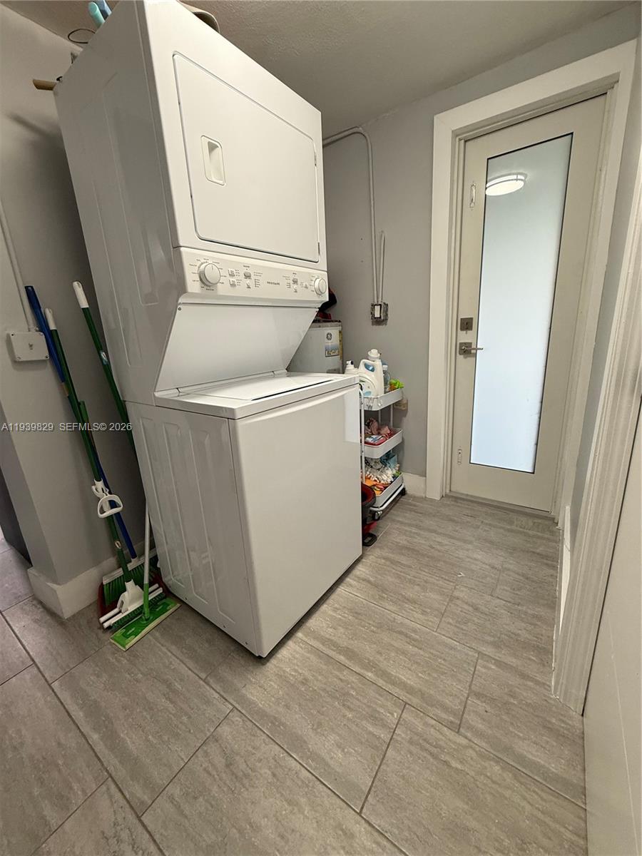 5280 Southwest 92nd Terrace Cooper City, FL 33328 - Photo 35 of 50 a view of a storage & utility room with washer and dryer
