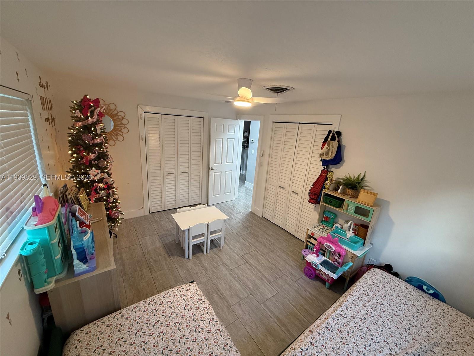 5280 Southwest 92nd Terrace Cooper City, FL 33328 - Photo 40 of 50 a living room with furniture and a couch