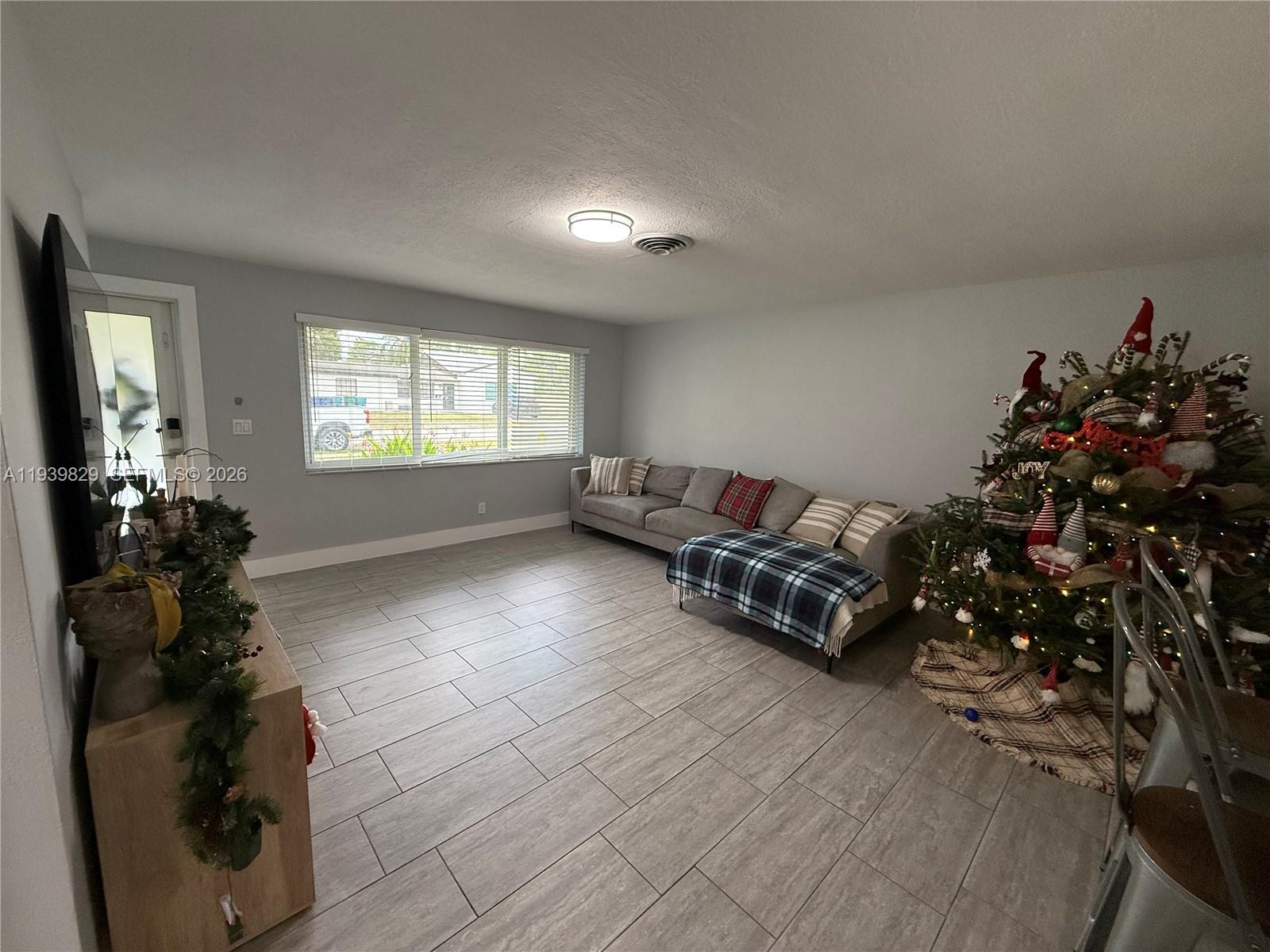 5280 Southwest 92nd Terrace Cooper City, FL 33328 - Photo 44 of 50 an empty room with windows