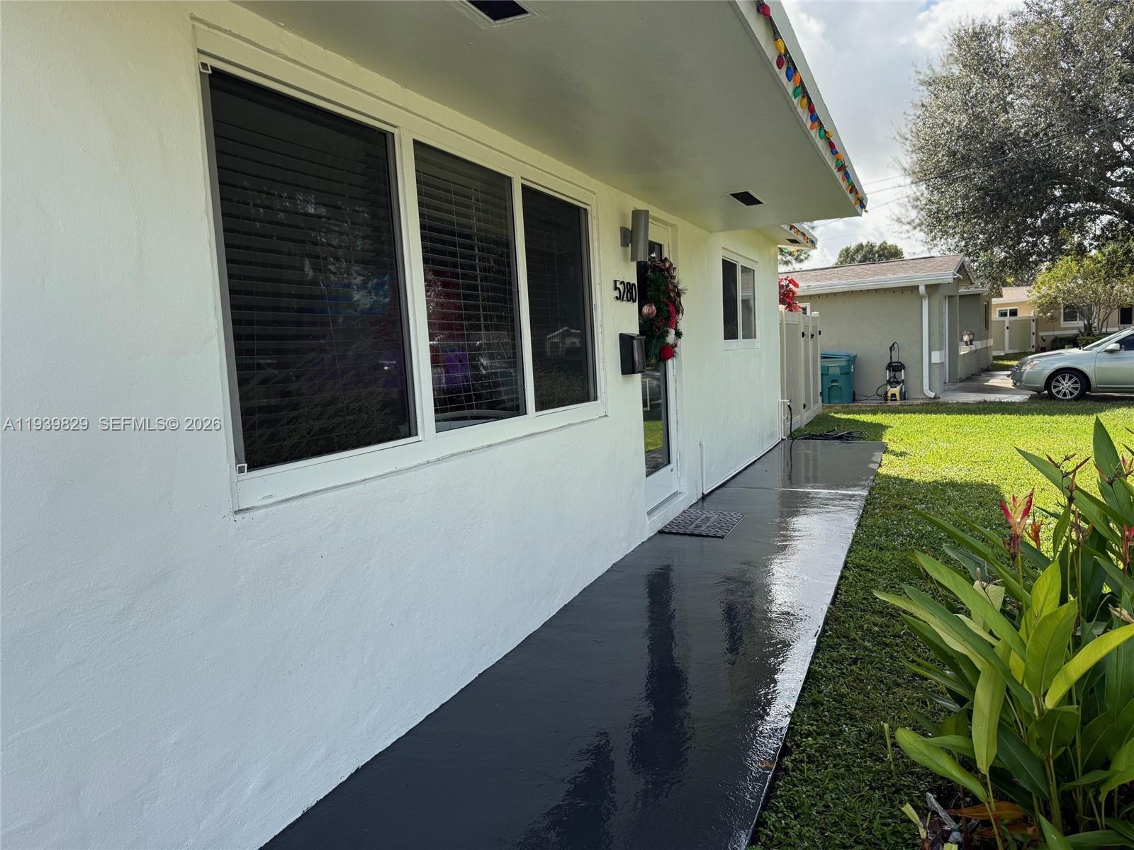 5280 Southwest 92nd Terrace Cooper City, FL 33328 - Photo 9 of 50 a view of a house with a yard