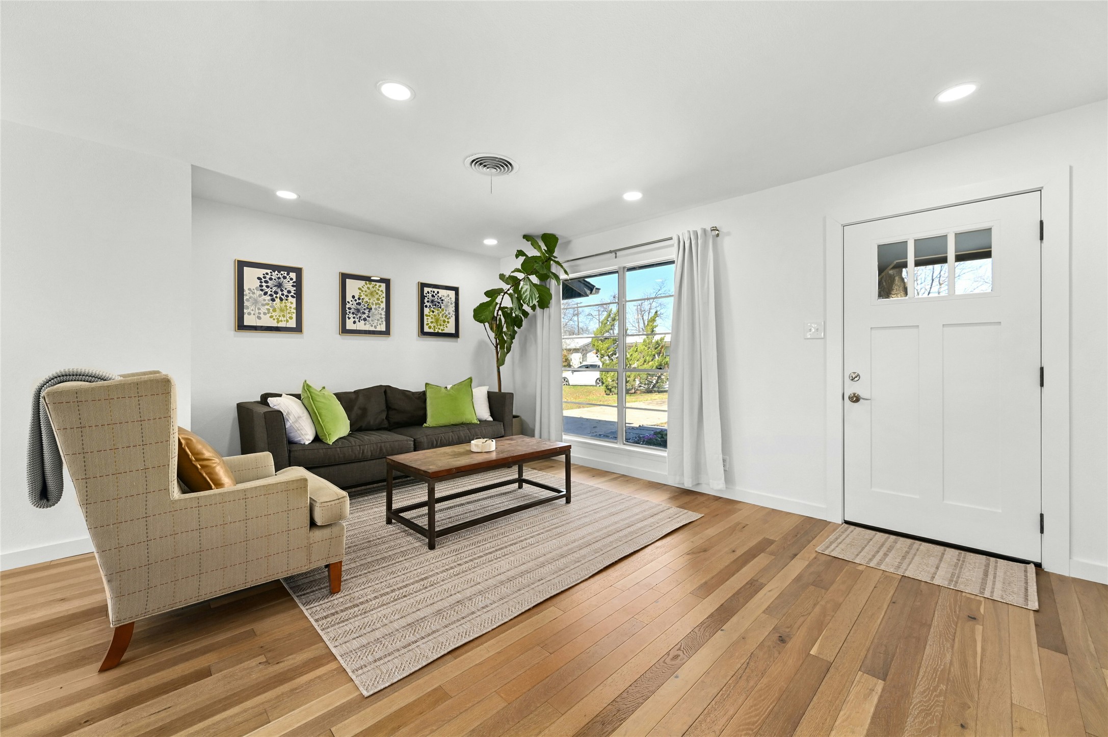 1801 Duke Avenue Austin, TX 78757 - Photo 3 of 26 Recessed lighting added to accompany large front picture window.