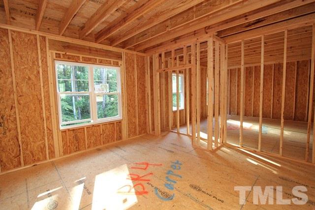 8636 Wapello Lane Raleigh, NC 27613 - Photo 12 of 21 a view of an empty room with a window