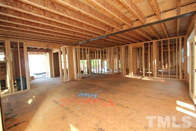 8636 Wapello Lane Raleigh, NC 27613 - Photo 7 of 21 a view of a room with wooden walls