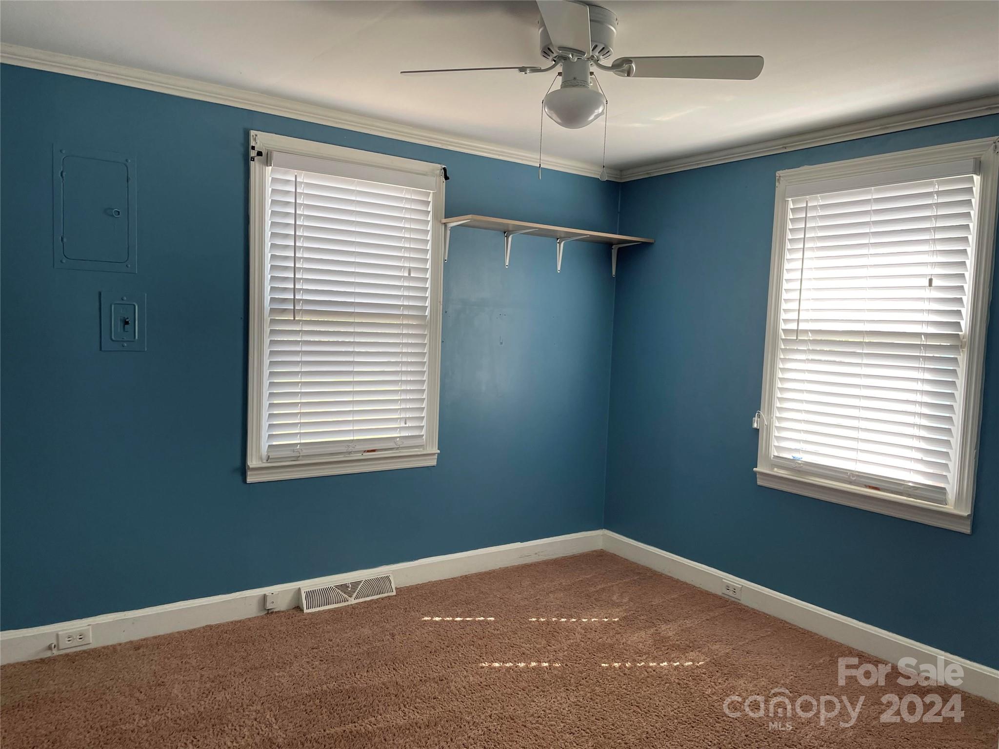 704 Union Cemetery Road Southwest Concord, NC 28027 - Photo 5 of 7 a view of an empty room with a window