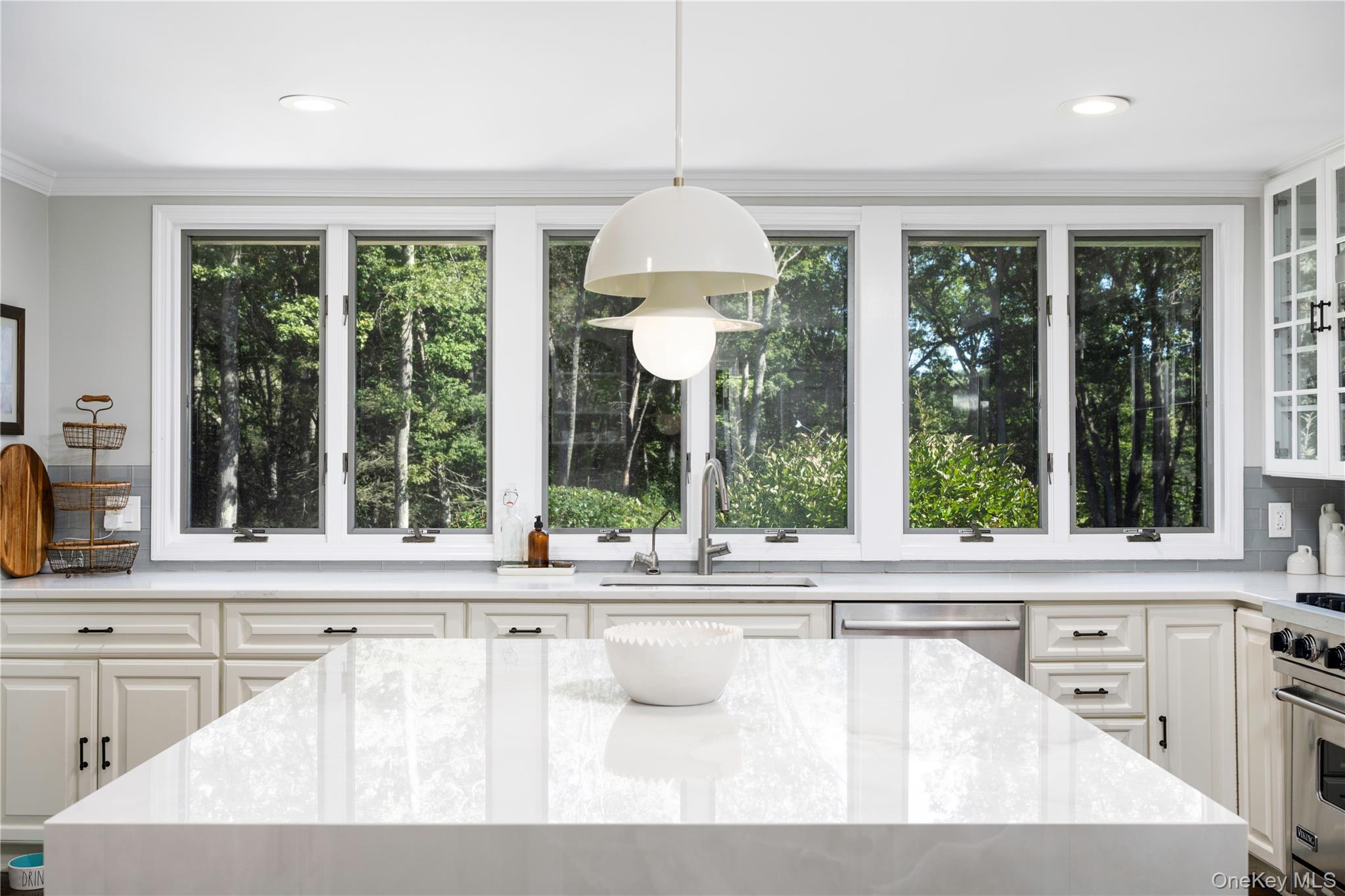 34 Hudson Ridge Garrison, NY 10524 - Photo 11 of 41 a living room with a sink and a large window
