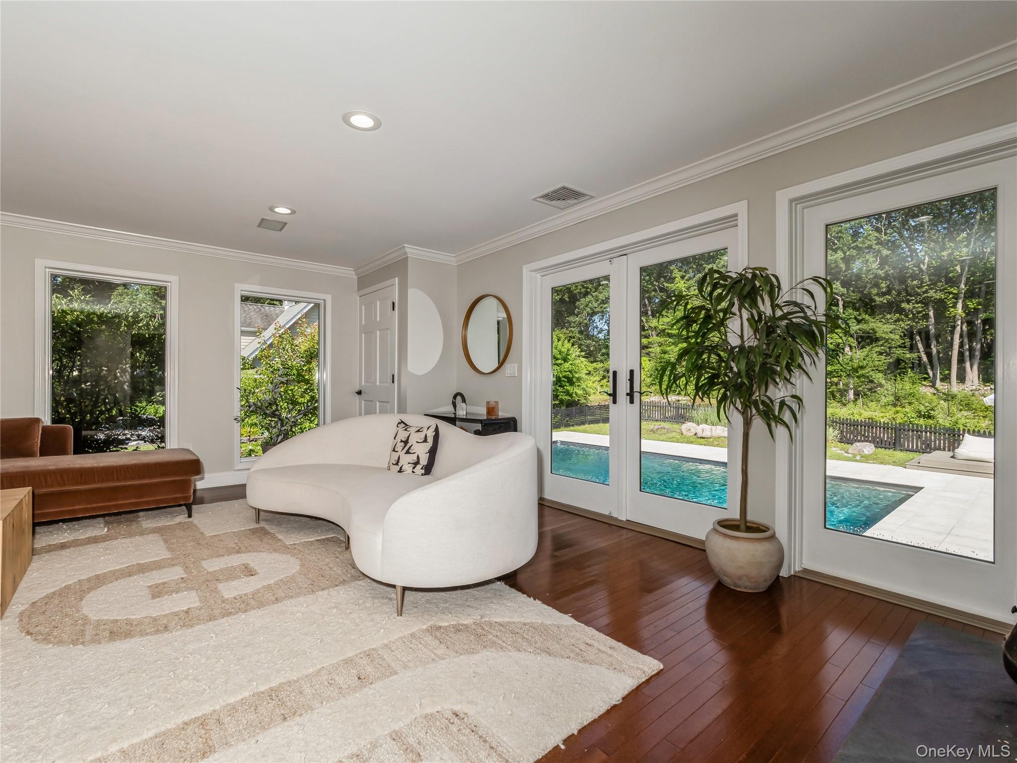 34 Hudson Ridge Garrison, NY 10524 - Photo 20 of 41 a living room with furniture and a large window