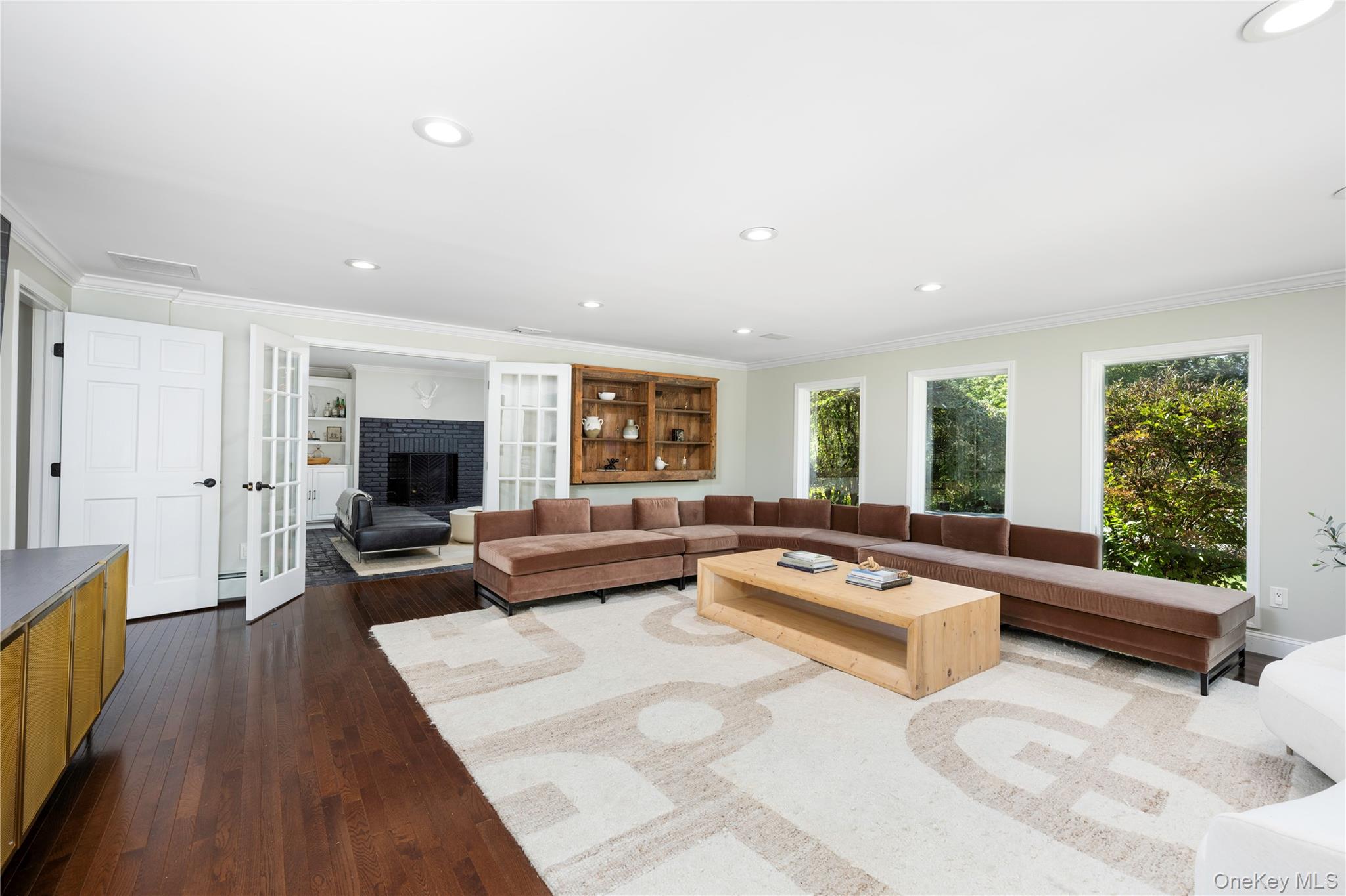 34 Hudson Ridge Garrison, NY 10524 - Photo 21 of 41 a living room with furniture and a fireplace
