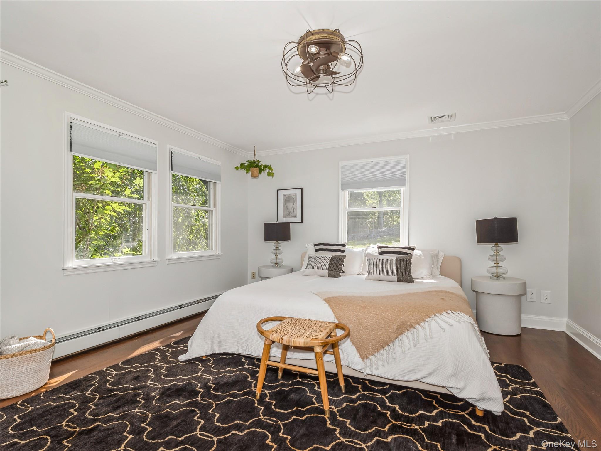 34 Hudson Ridge Garrison, NY 10524 - Photo 25 of 41 a bed room with a bed and a chair