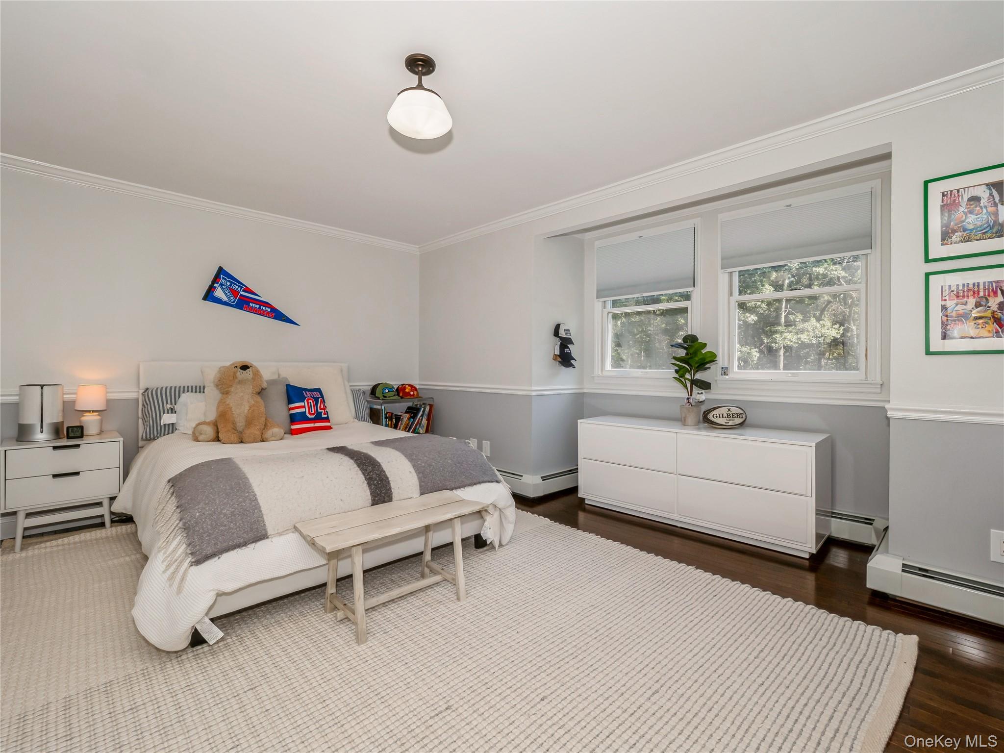 34 Hudson Ridge Garrison, NY 10524 - Photo 30 of 41 a spacious bedroom with a bed and a couch