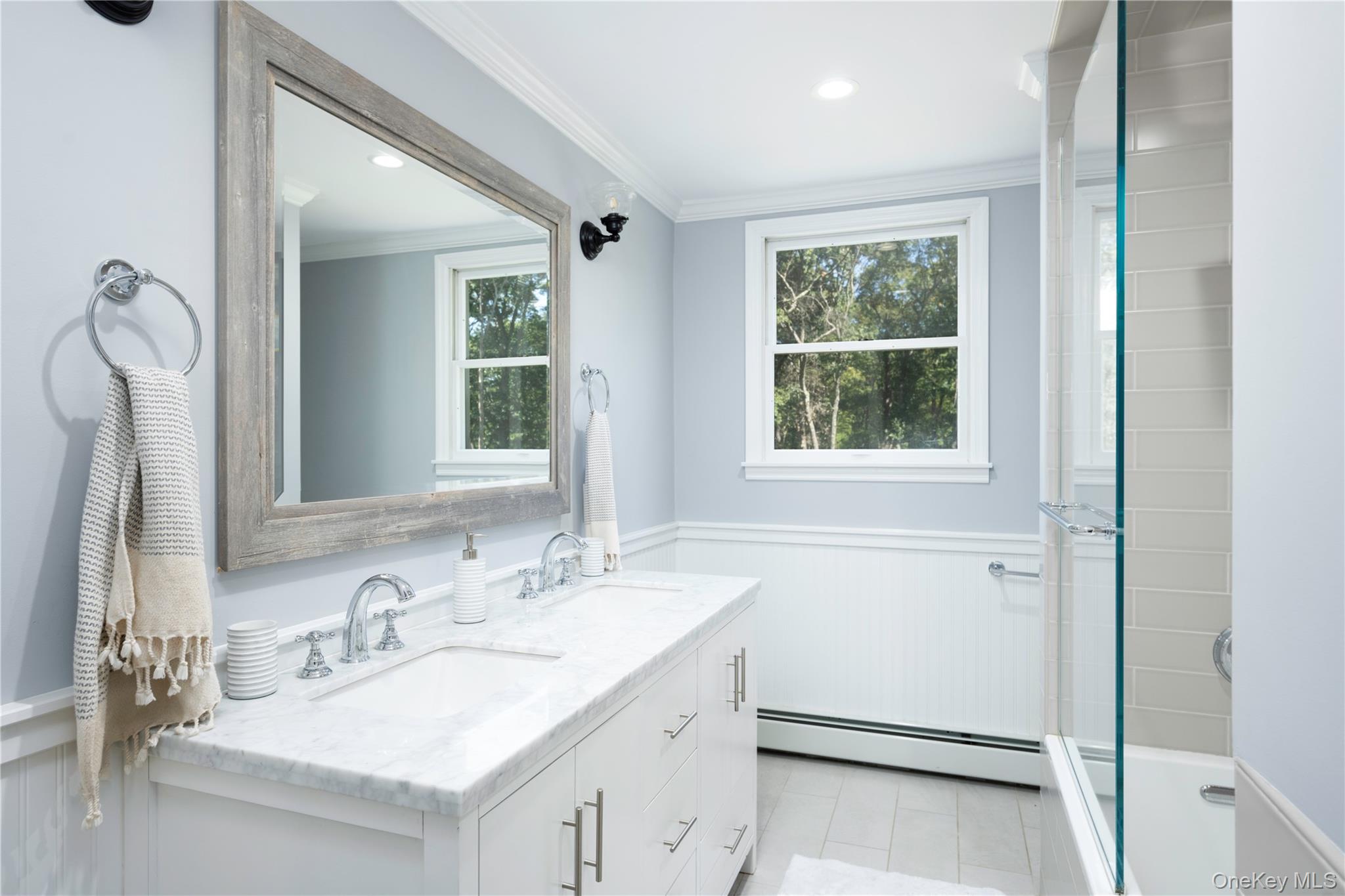 34 Hudson Ridge Garrison, NY 10524 - Photo 31 of 41 a bathroom with a sink and a mirror