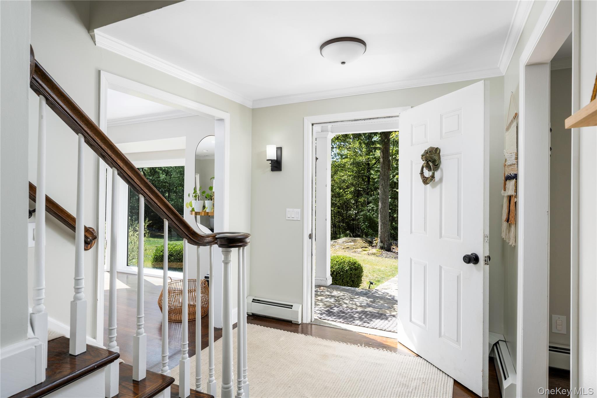 34 Hudson Ridge Garrison, NY 10524 - Photo 4 of 41 a view of entryway with wooden floor and livingroom view