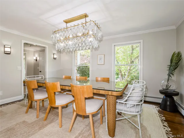 a kitchen with stainless steel appliances a sink and a large window