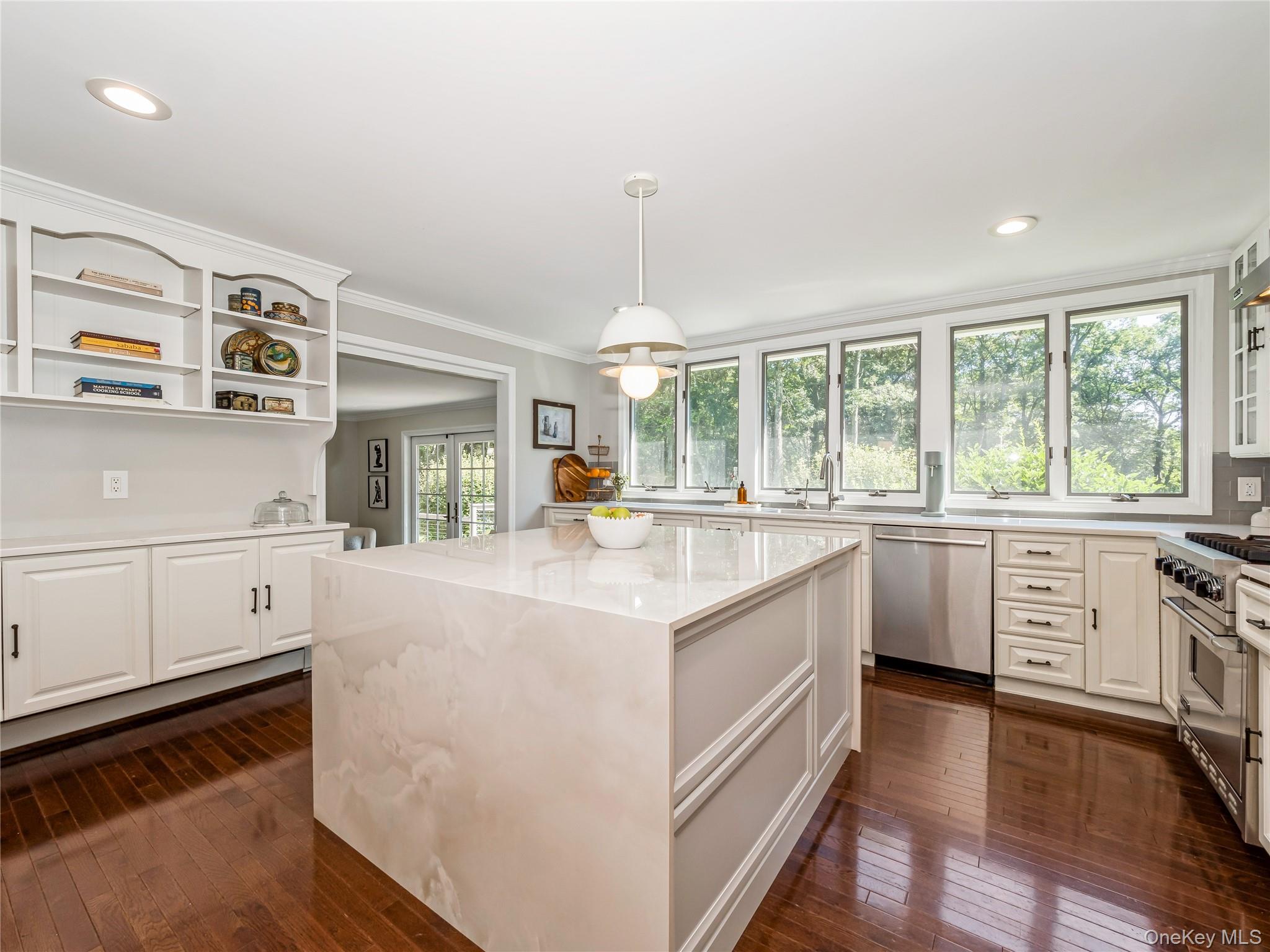 34 Hudson Ridge Garrison, NY 10524 - Photo 10 of 41 a kitchen with white cabinets and white appliances