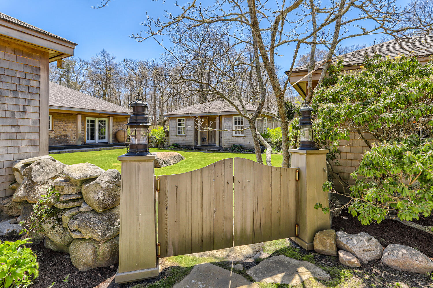 300 N Road Chilmark, MA 02535 - Photo 12 of 69 a view of a house with backyard and sitting area