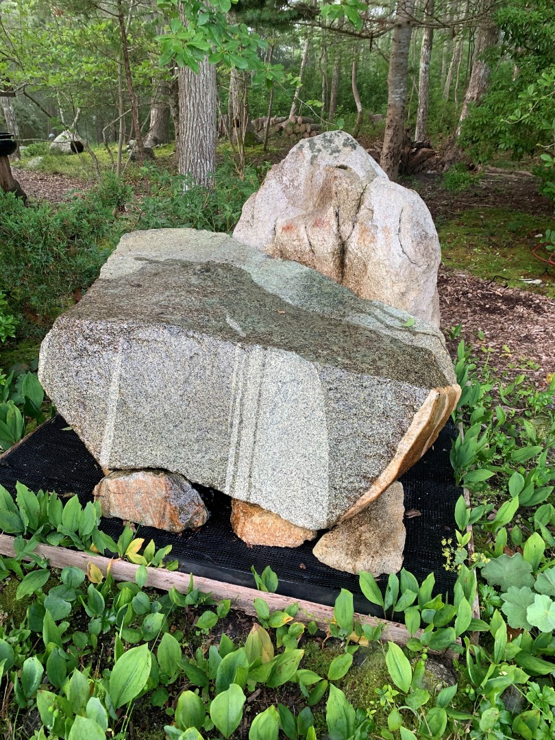 300 N Road Chilmark, MA 02535 - Photo 18 of 69 a view of a backyard of a house with a lake view