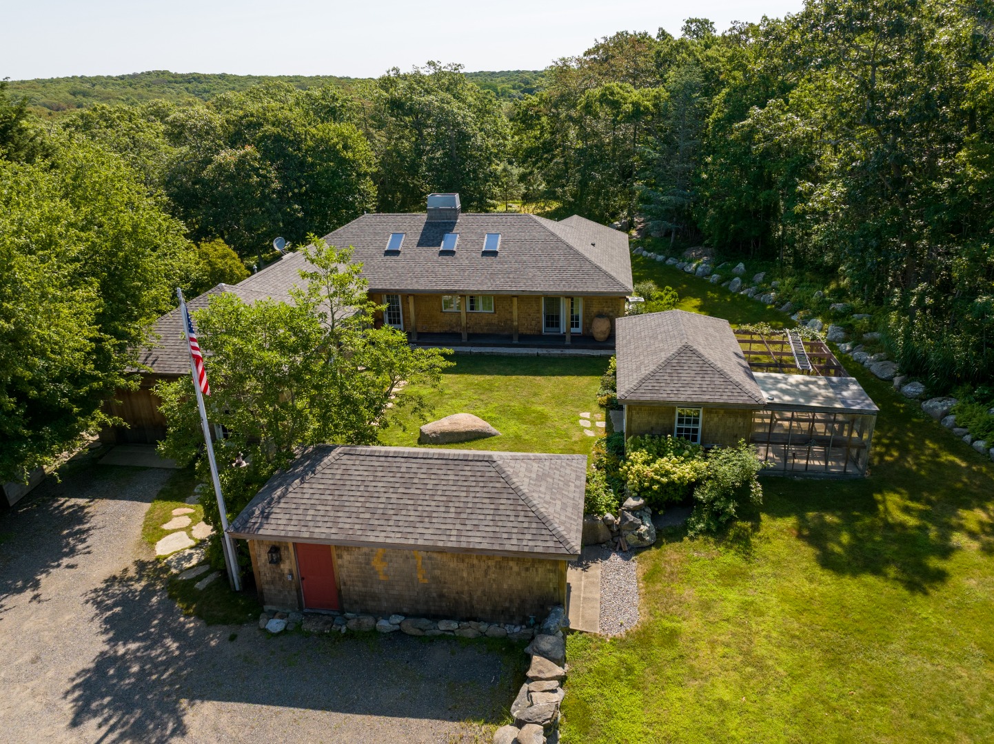 300 N Road Chilmark, MA 02535 - Photo 2 of 69 a aerial view of a house with swimming pool lawn chairs and a yard