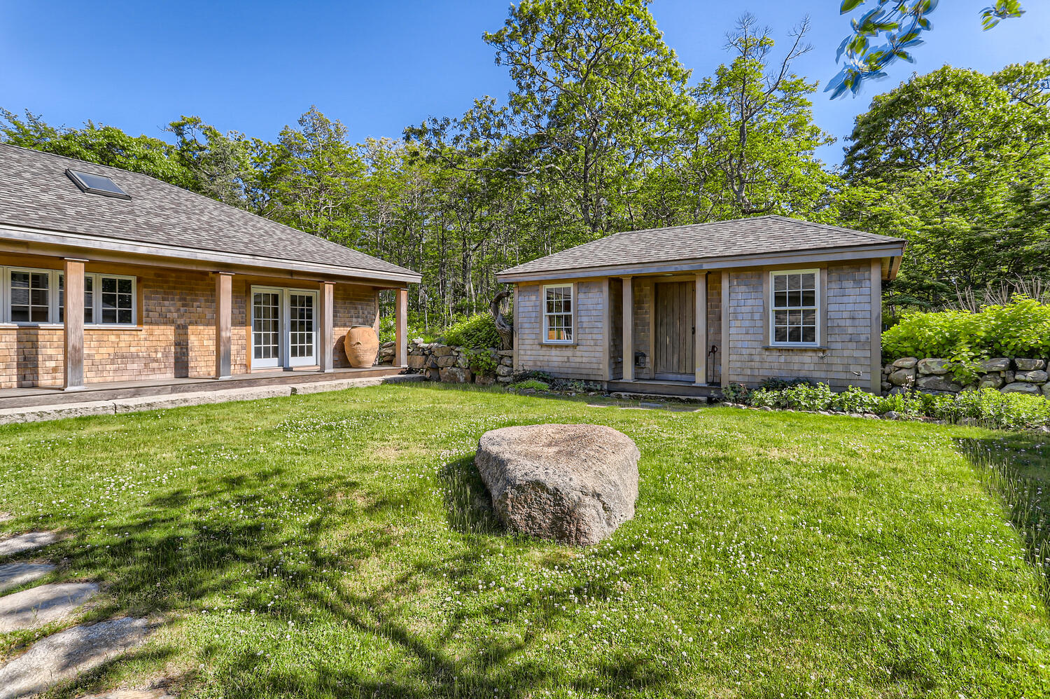 300 N Road Chilmark, MA 02535 - Photo 21 of 69 a view of a house with a backyard