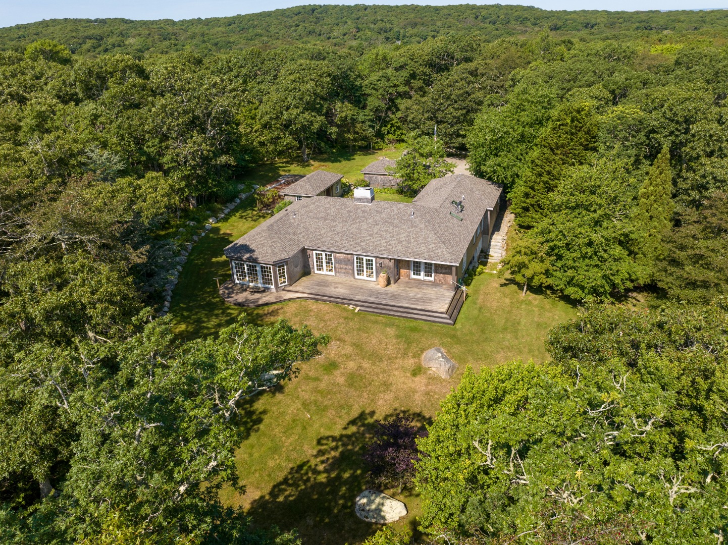 300 N Road Chilmark, MA 02535 - Photo 3 of 69 a view of a house with a yard and pool