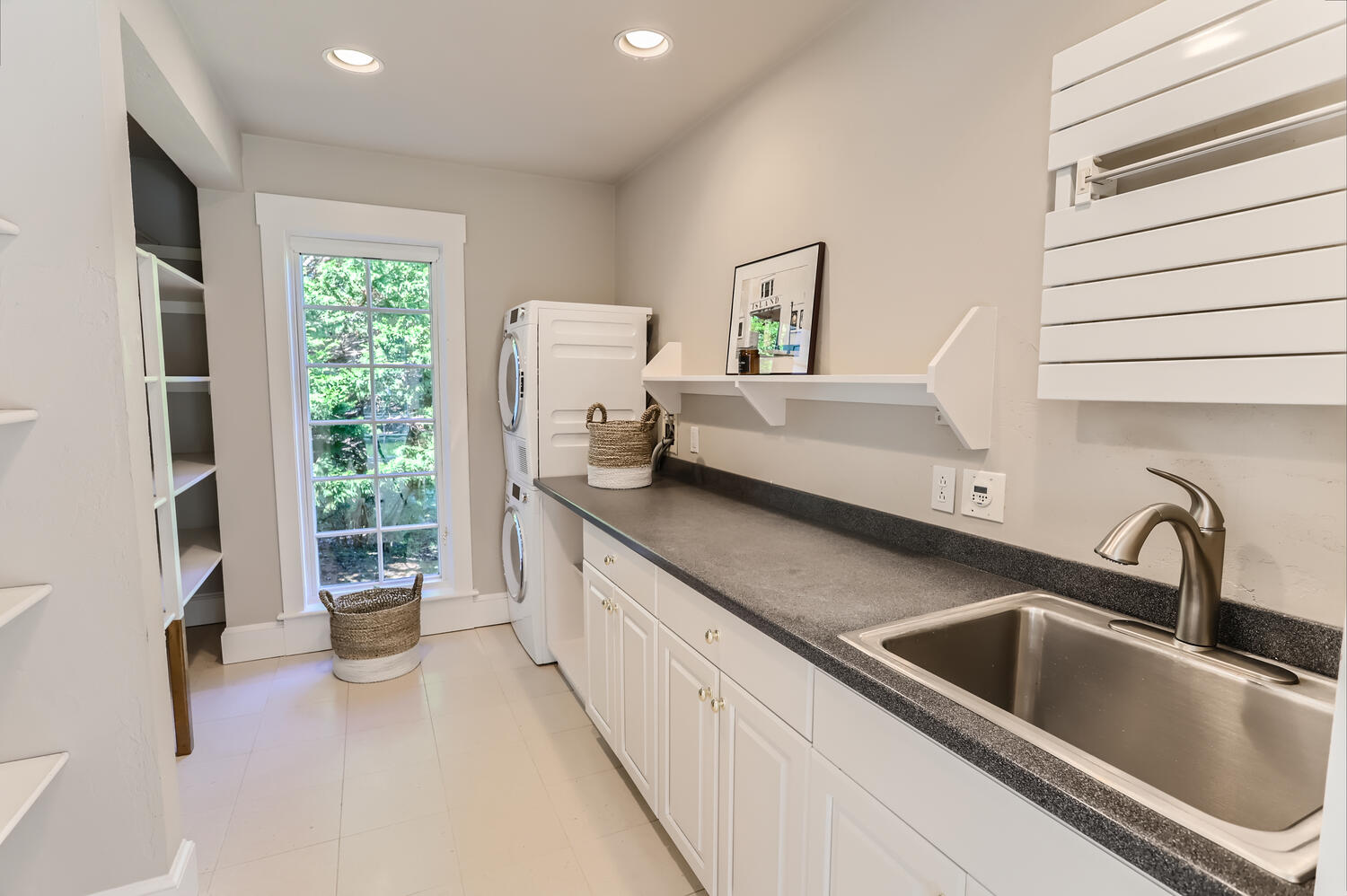 300 N Road Chilmark, MA 02535 - Photo 54 of 69 a kitchen with a sink and a refrigerator