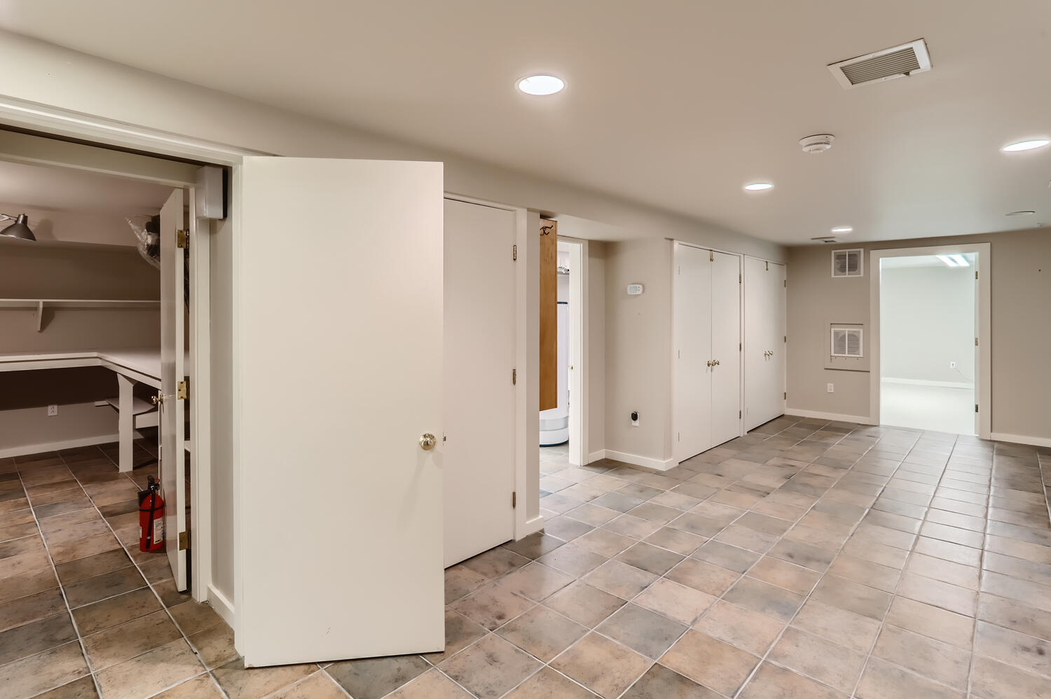 300 N Road Chilmark, MA 02535 - Photo 56 of 69 a view of a hallway with wooden shelves