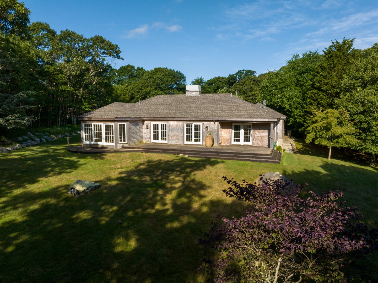300 N Road Chilmark, MA 02535 - Photo 6 of 69 a house with river in front of it