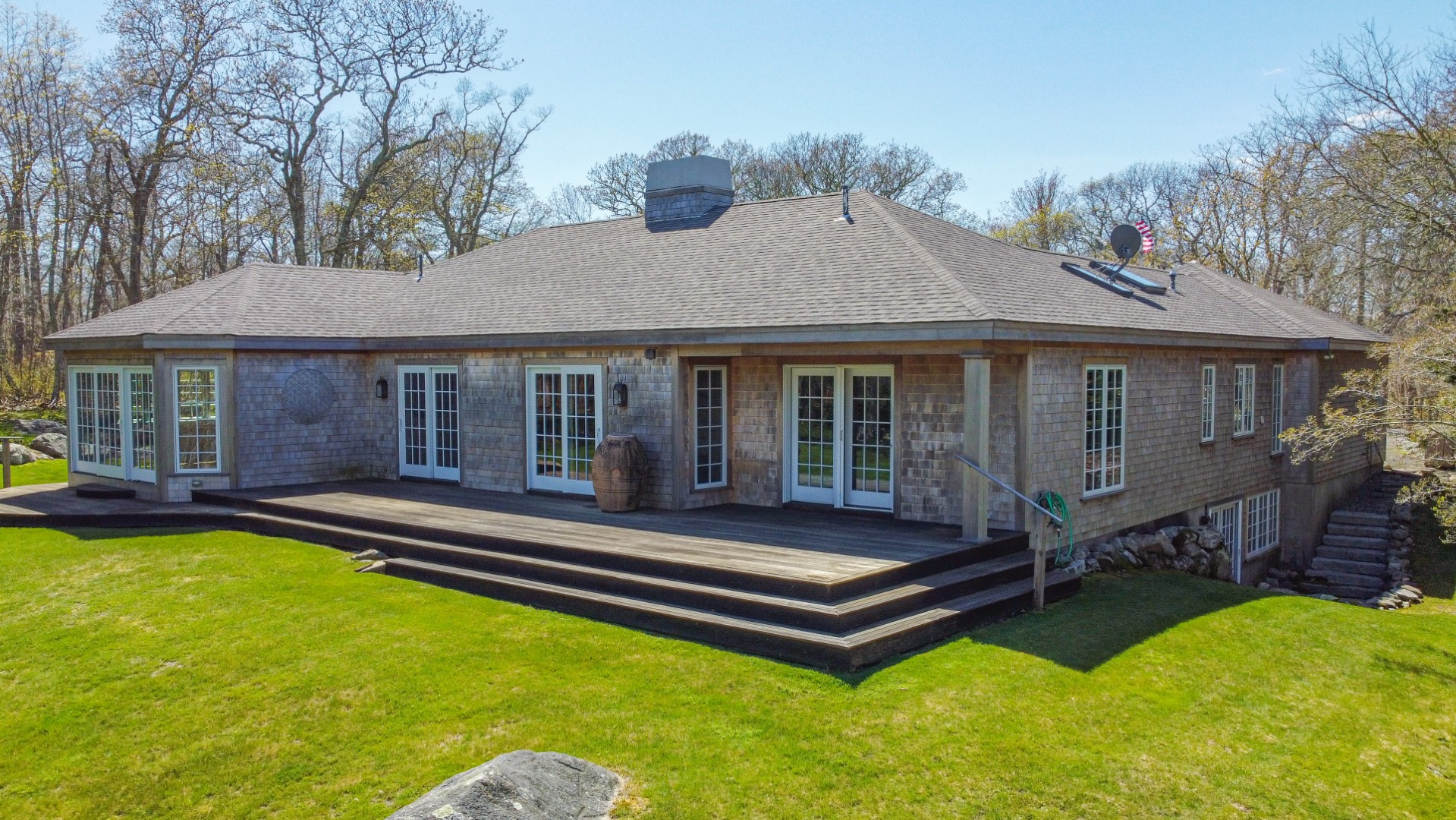 300 N Road Chilmark, MA 02535 - Photo 8 of 69 a view of a house with swimming pool and sitting area