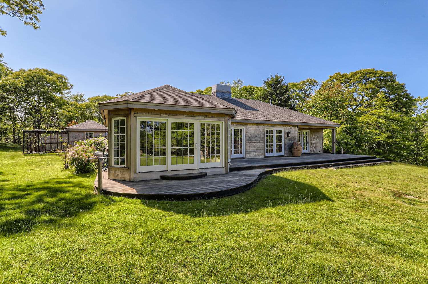 300 N Road Chilmark, MA 02535 - Photo 9 of 69 a view of a house with a swimming pool
