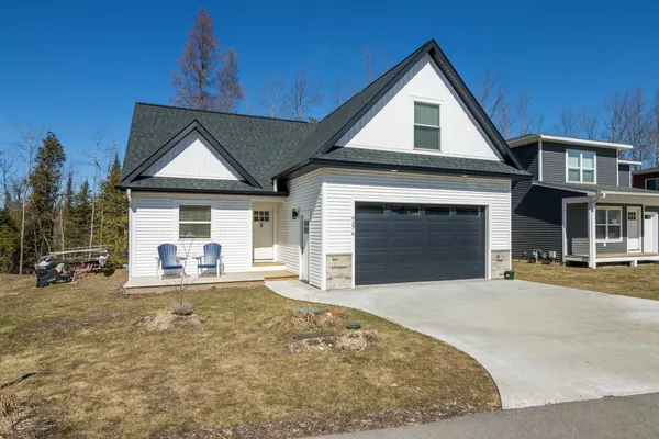 $449,000 | 9276 South Flaska Drive, Unit 10 LOT: 10, Cedar, MI 49621