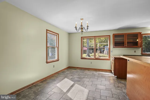 a view of an empty room with window